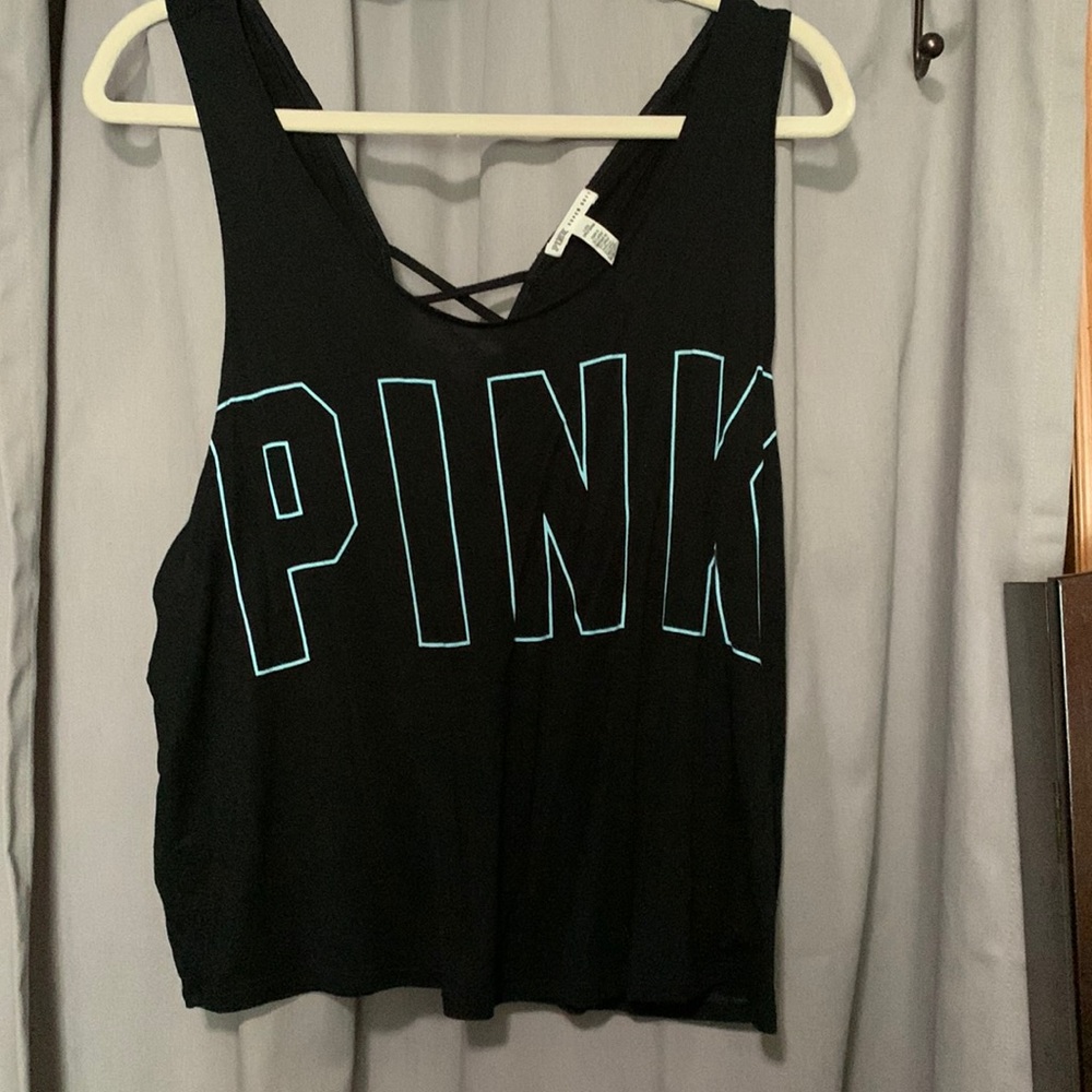 Never worn. Pink tank top size large.